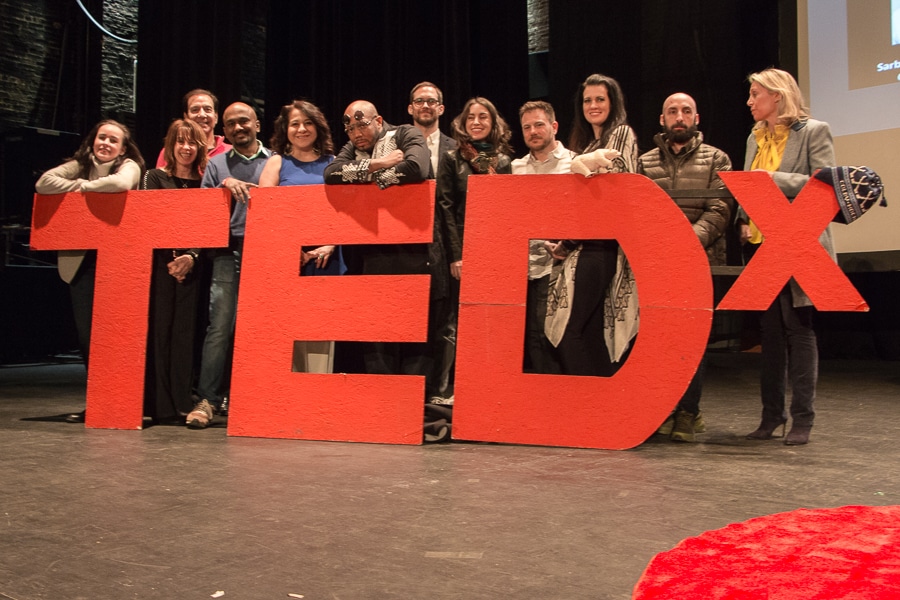 TEDxAsburyPark speakers are positioned behind the TEDx sign, after they finished the second live audition.
